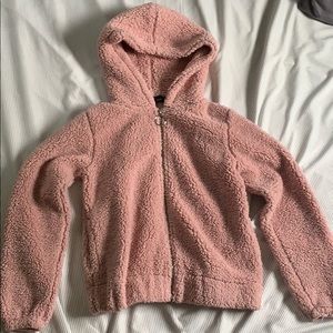 fluffy light pink cropped zip-up